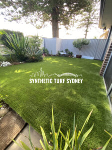 A lush synthetic turf backyard in Sydney under natural sunlight.
